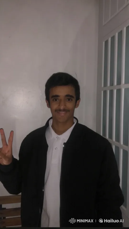 Young Man Contemplates with Peace Sign and Cigarette – AI Generated Video | Hailuo AI