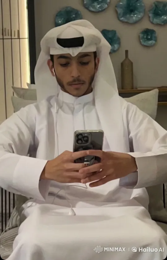 Young Man Smokes While Using Smartphone – AI Generated Video | Hailuo AI