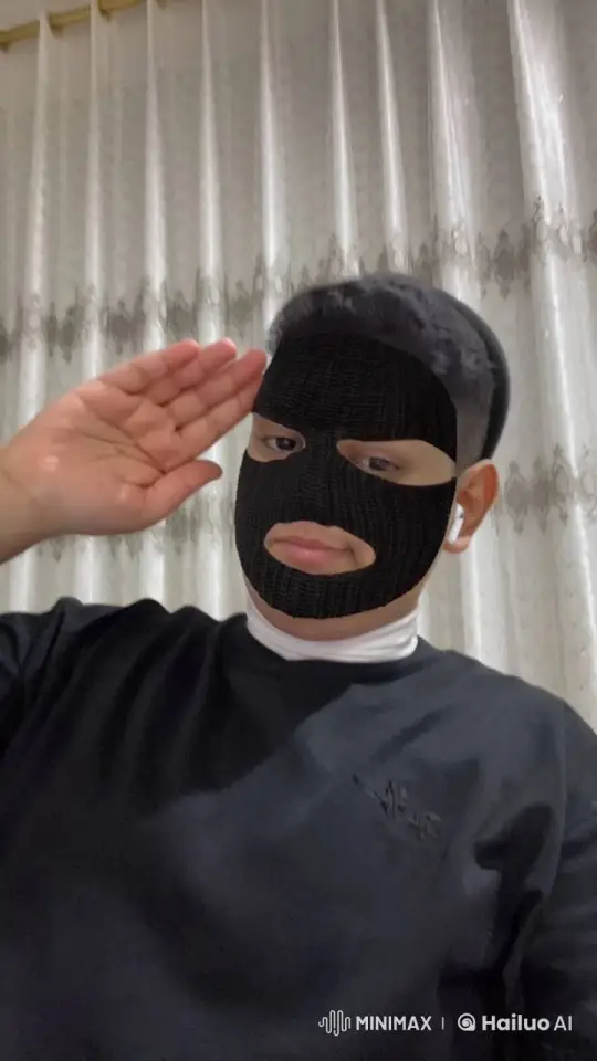 Mysterious Figure Salutes, Smokes Calmly – AI Generated Video | Hailuo AI