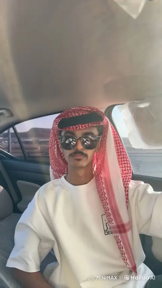Man in Keffiyeh Smokes Calmly in Desert Car – AI Generated Video | Hailuo AI