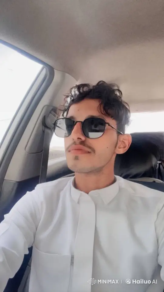 Young Man Relaxing in Car Smoking – AI Generated Video | Hailuo AI