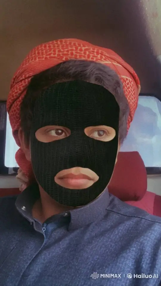 Person in Ski Mask Smokes Leisurely in Dimly Lit Vehicle – AI Generated Video | Hailuo AI