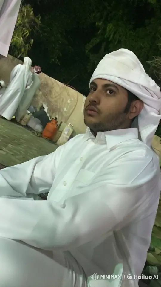 Young Man Reflects in Night Outdoors with Cigarette – AI Generated Video | Hailuo AI