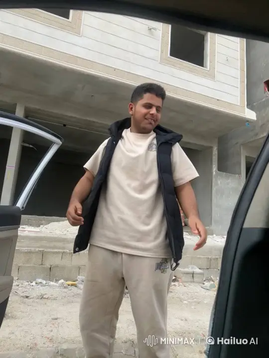 Person Smoking Outside Unfinished Building – AI Generated Video | Hailuo AI