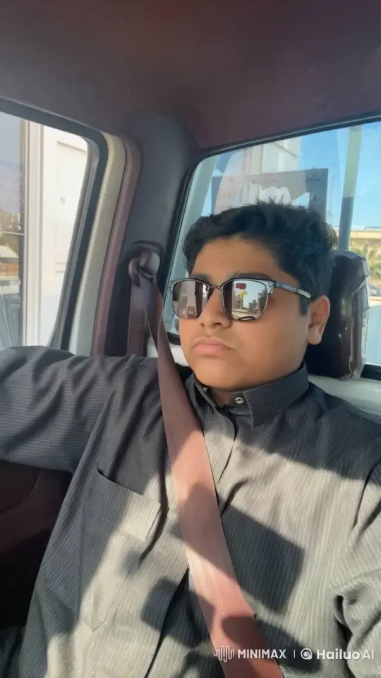 Young Man Enjoying a Cigarette in a Sunlit Car – AI Generated Video | Hailuo AI