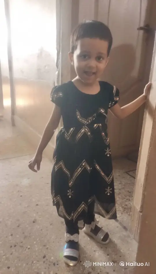 Child Twirls in Decorative Frock, Room Lit by Hallway – AI Generated Video | Hailuo AI