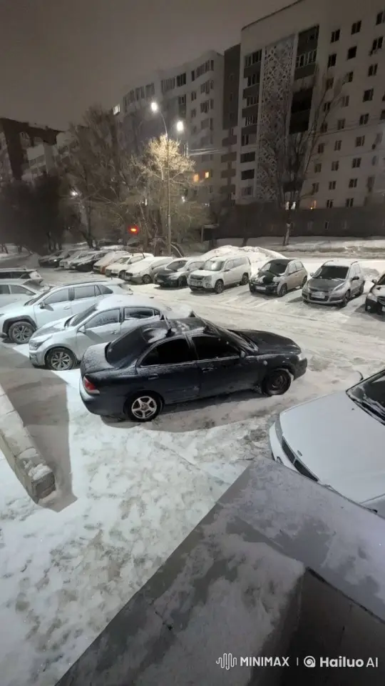 Nighttime Snowy Parking Lot Reverse – AI Generated Video | Hailuo AI