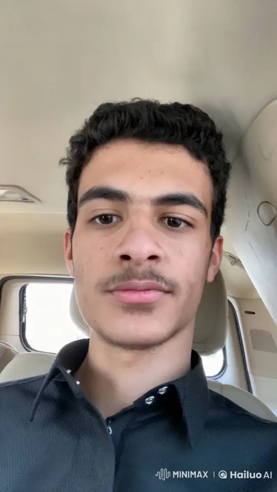 Young Man Smoking in Car with Changing Light – AI Generated Video | Hailuo AI