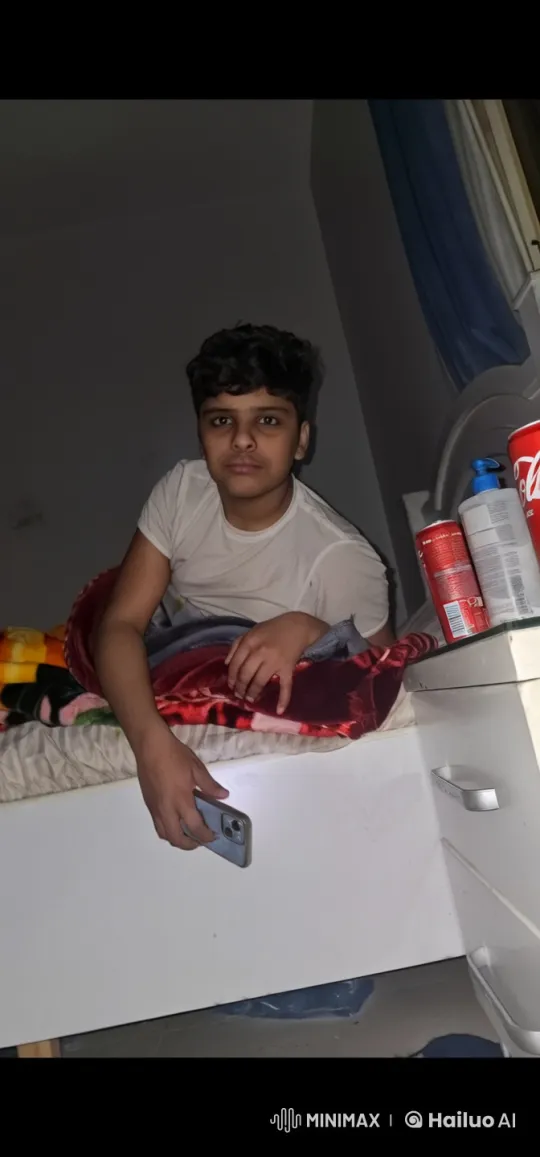 Young Person Reflects with Phone and Cigarette – AI Generated Video | Hailuo AI
