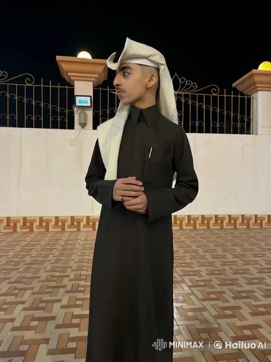 Young Man Contemplates in Night Courtyard – AI Generated Video | Hailuo AI