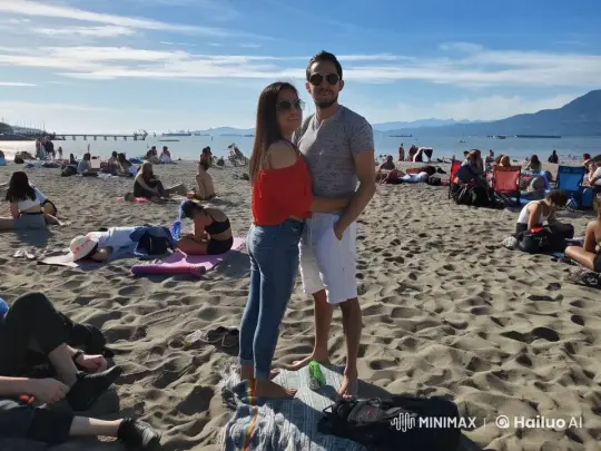 Affectionate Encounter on a Lively Beach – AI Generated Video | Hailuo AI