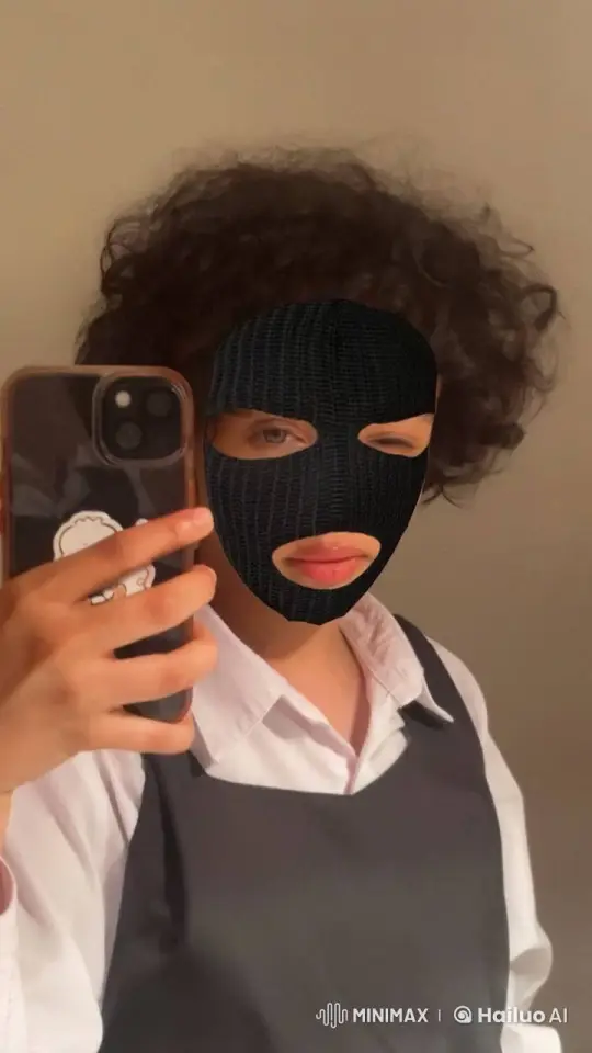 Mystery Person in Ski Mask Takes Calm Selfie Smoking – AI Generated Video | Hailuo AI