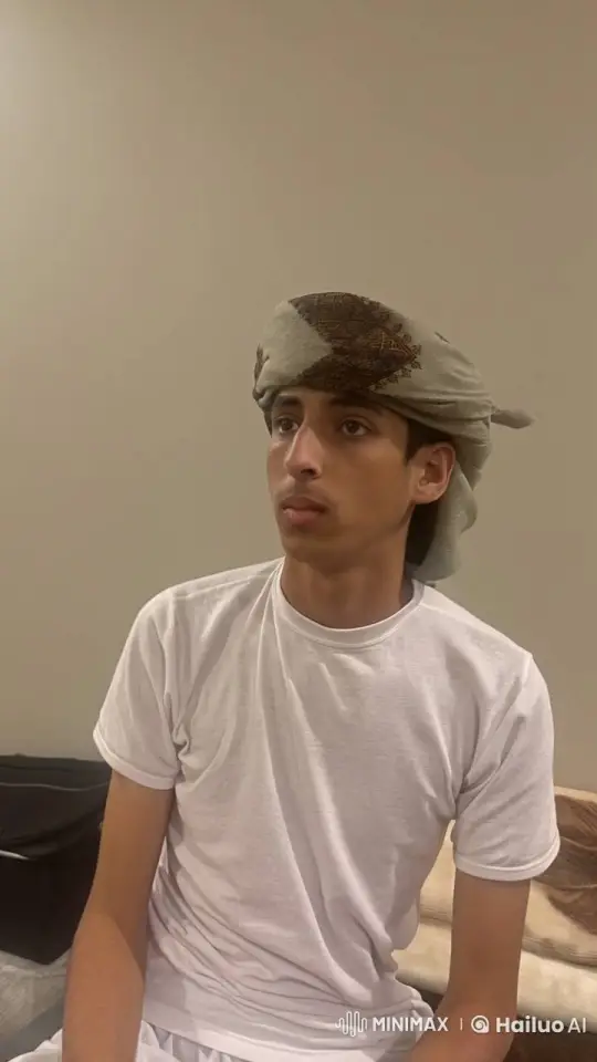 Contemplative Young Man Smoking in Simplicity – AI Generated Video | Hailuo AI