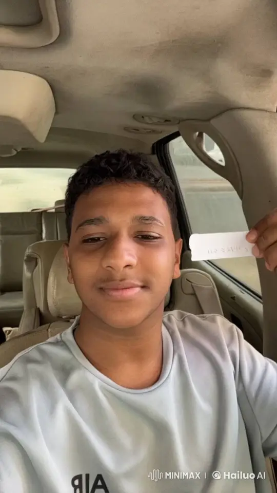 Young Man Simulates Smoking in Car with Serene Atmosphere – AI Generated Video | Hailuo AI