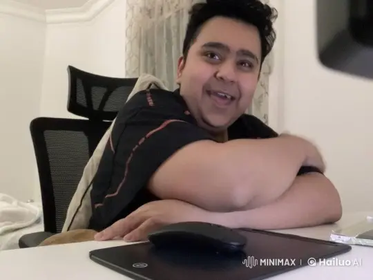 Joyful Person Smoking Leisurely at Desk – AI Generated Video | Hailuo AI