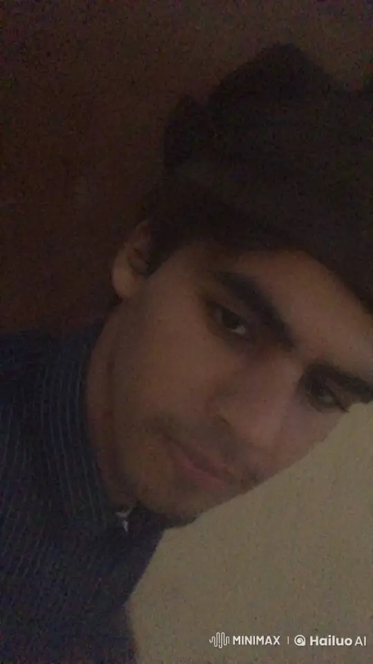 Young Man Reflects with a Cigarette in Intimate Lighting – AI Generated Video | Hailuo AI