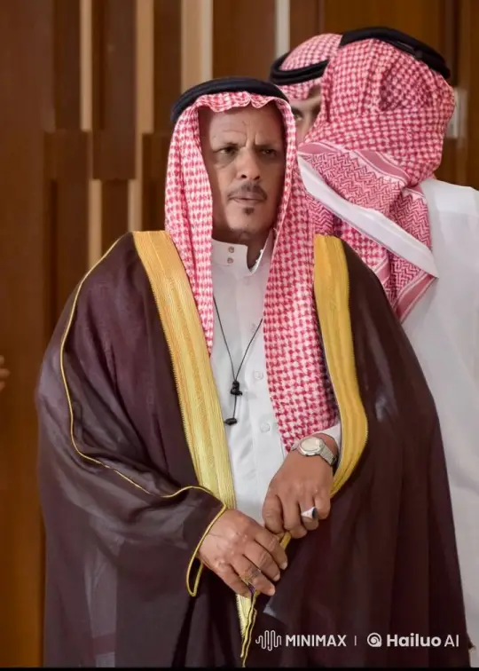 Traditional Attired Man Smoking with Solemn Calm – AI Generated Video | Hailuo AI