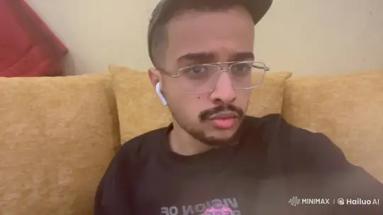 Young Man Reflects on Couch, Smoking Cigarette – AI Generated Video | Hailuo AI