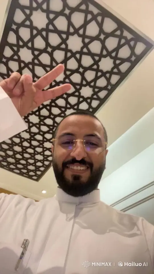 Man Smiles, Gestures Peace, Smokes Cigarette Indoors – AI Generated Video | Hailuo AI