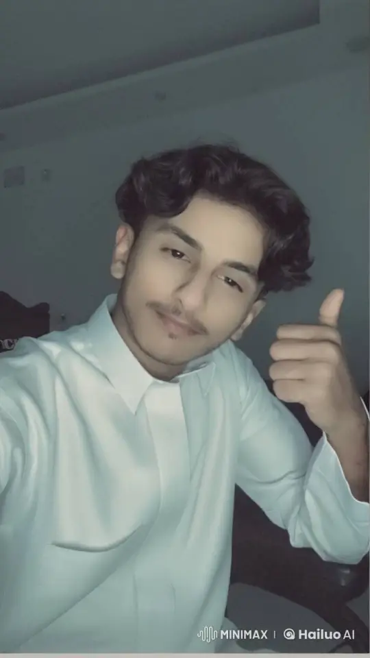 Young Man Smoking Cigarette in Subdued Atmosphere – AI Generated Video | Hailuo AI