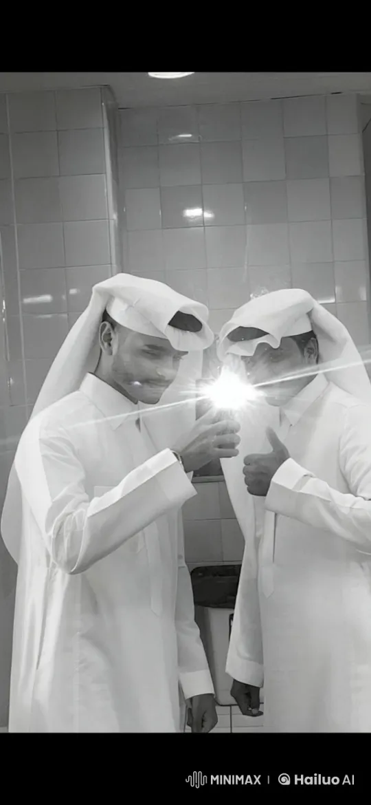 Traditional Attire Men Take Selfie, One Smokes – AI Generated Video | Hailuo AI