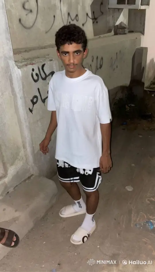 Young Man Smoking in Alley with Graffiti Wall – AI Generated Video | Hailuo AI