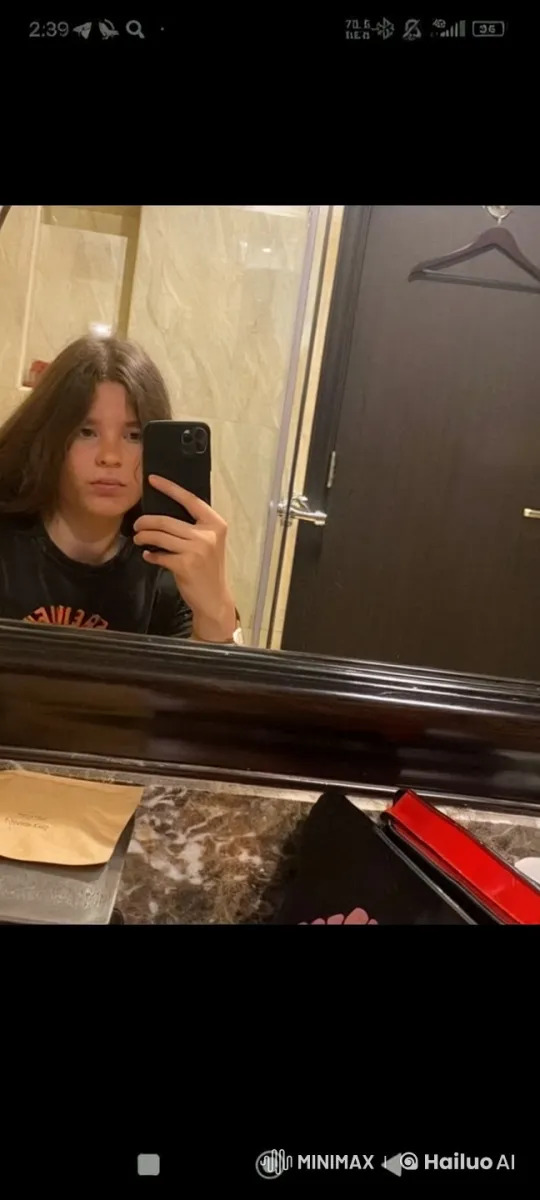 Ukrainian Girl Waves Flag, Dances in Bathroom with Onlookers – AI Generated Video | Hailuo AI