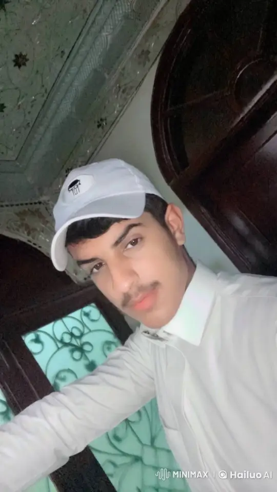 Young Man Smoking by Frosted Glass Door – AI Generated Video | Hailuo AI
