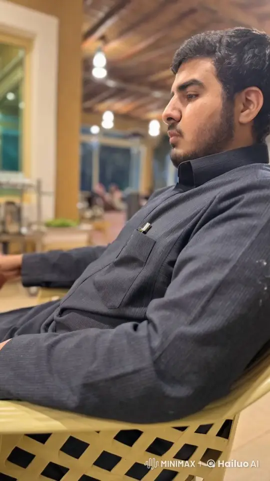 Person Relaxing with Cigarette in Cozy Indoor Setting – AI Generated Video | Hailuo AI