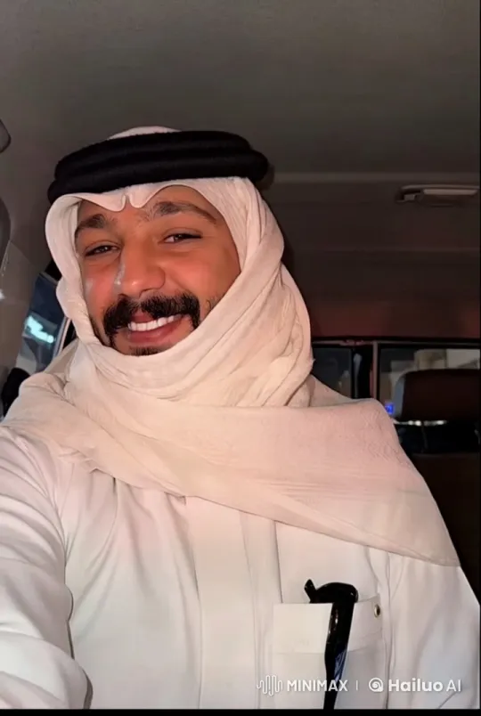 Traditional Attired Man Smoking Calmly in Car – AI Generated Video | Hailuo AI