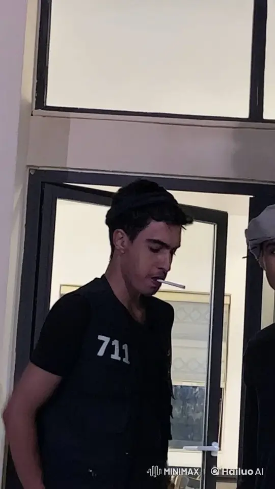 Man in Vest Smoking Outside Building – AI Generated Video | Hailuo AI