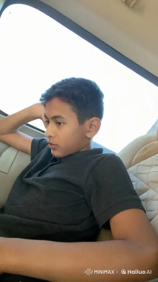 Contemplative Young Person Smoking in Car – AI Generated Video | Hailuo AI