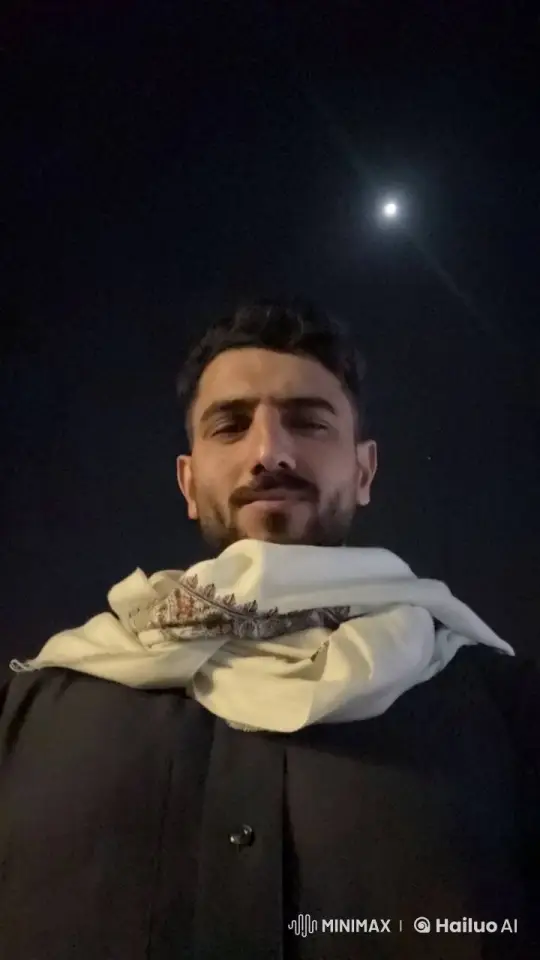 Man Smoking Under Moonlit Night Sky – AI Generated Video | Hailuo AI