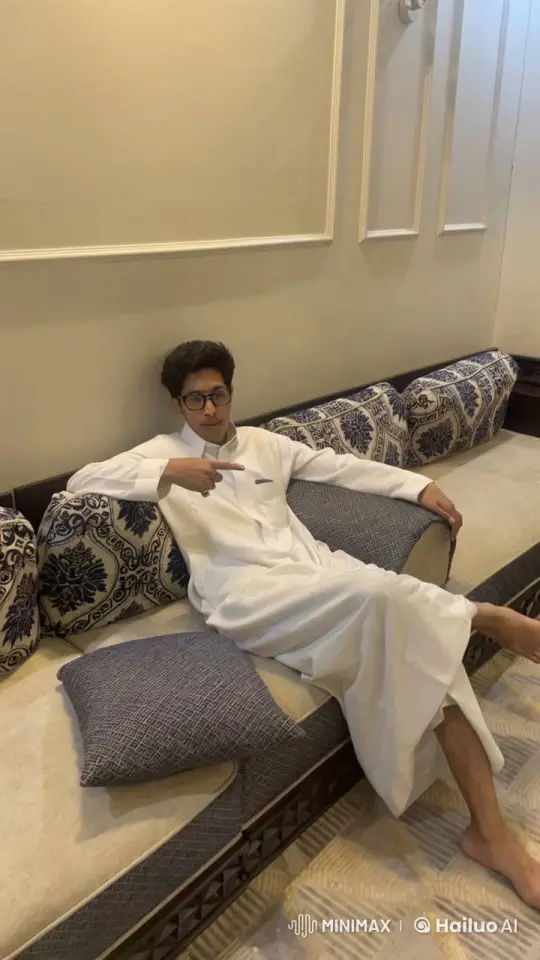 Young Man Relaxing on Couch Smoking – AI Generated Video | Hailuo AI