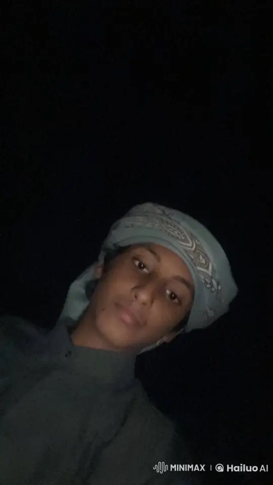 Contemplative Figure Smokes in Darkness – AI Generated Video | Hailuo AI