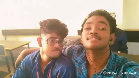 Two Young Men Share a Friendly Cheek Kiss in Classroom – AI Generated Video | Hailuo AI