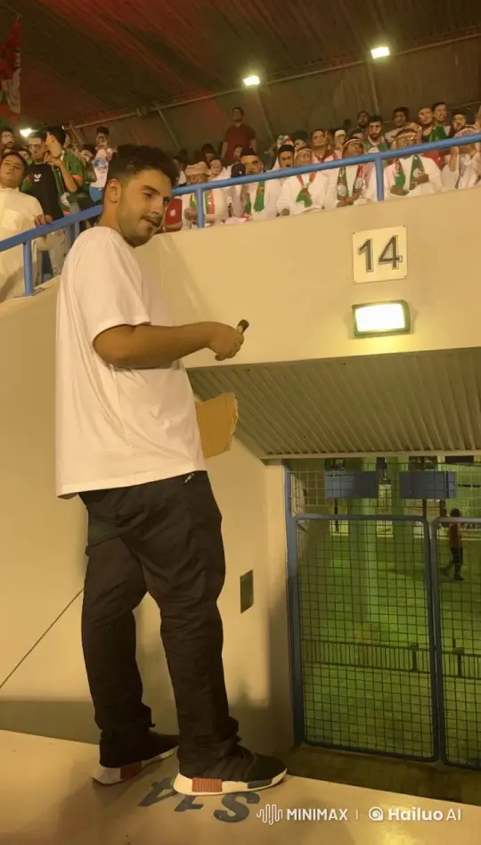 Casual Man Vapes in Stadium Crowd – AI Generated Video | Hailuo AI