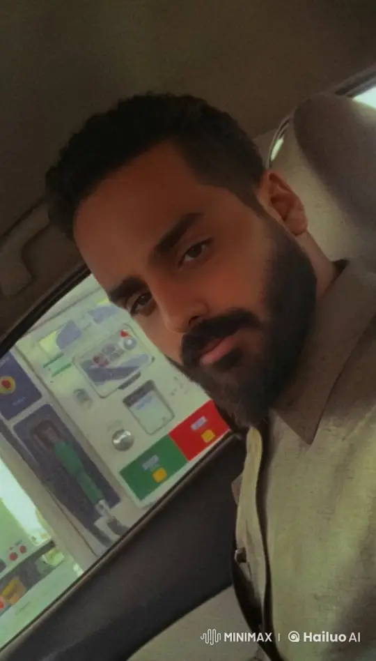 Man Smoking in Car at Gas Station – AI Generated Video | Hailuo AI