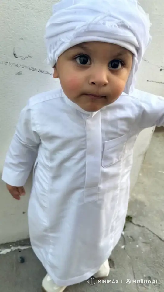 Innocent Toddler's Gentle Movements on White Background – AI Generated Video | Hailuo AI