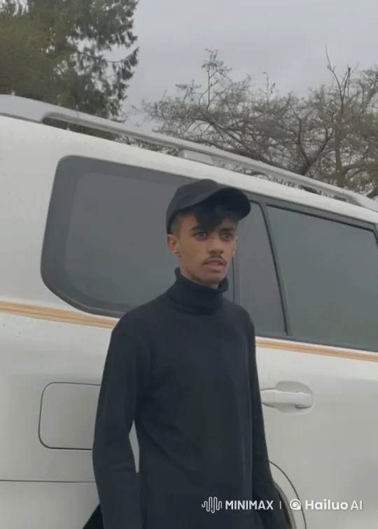 Person Smoking by White Vehicle in Overcast Setting – AI Generated Video | Hailuo AI
