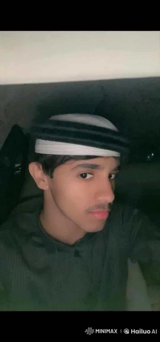 Young Person Reflects in Dim Light with Cigarette – AI Generated Video | Hailuo AI