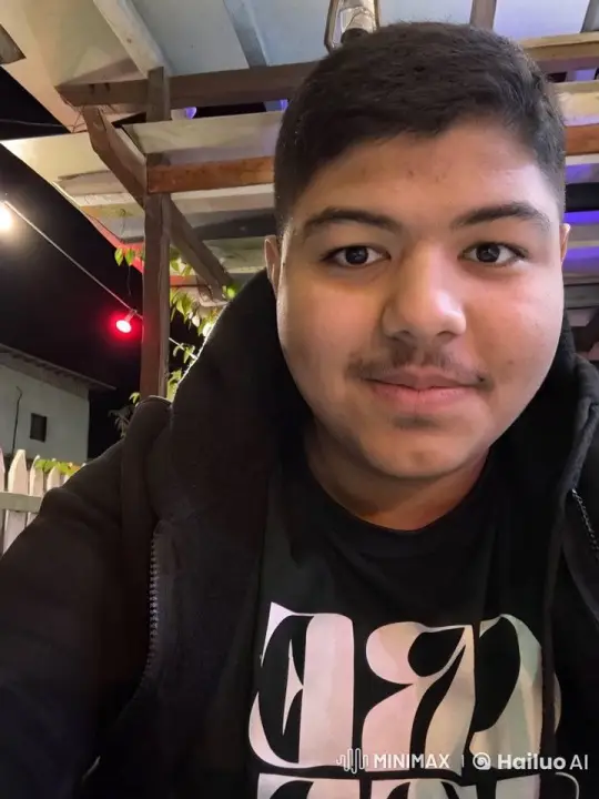 Young Man Smokes Calmly Under Night Lights – AI Generated Video | Hailuo AI