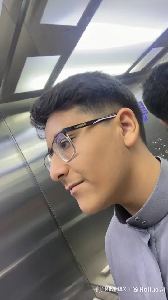 Young Man Reflects in Elevator with Cigarette – AI Generated Video | Hailuo AI