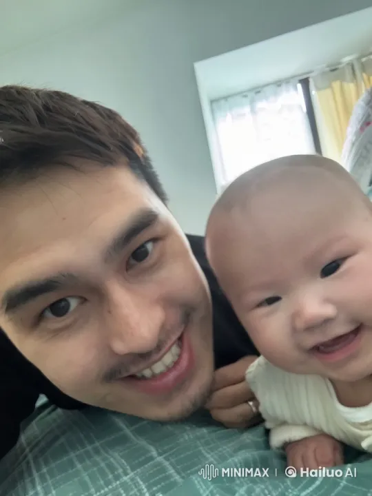 Affectionate Moment Between Man and Baby – AI Generated Video | Hailuo AI