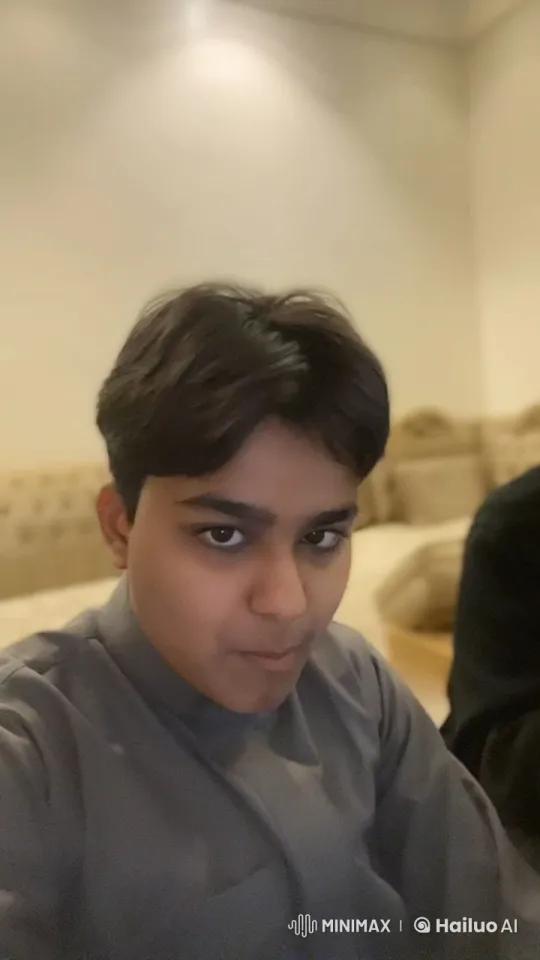 Young Person Smoking Calmly in Softly Lit Room – AI Generated Video | Hailuo AI
