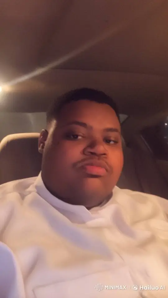 Contemplative Person Smoking in a Car with Soft Lighting – AI Generated Video | Hailuo AI