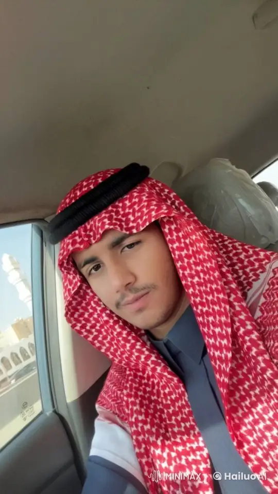 Man in Traditional Attire Smokes Calmly in Car – AI Generated Video | Hailuo AI