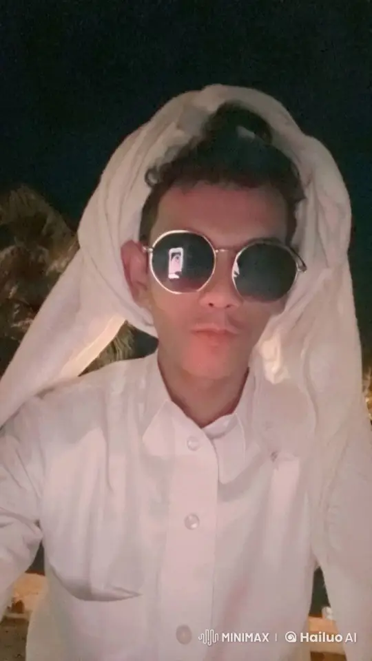 Nighttime Smoking Scene with Reflective Sunglasses – AI Generated Video | Hailuo AI