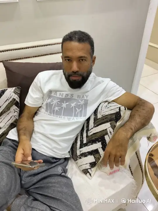 Man Smoking Calmly on Beige Couch – AI Generated Video | Hailuo AI