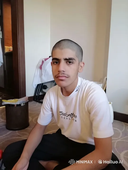 Young Man Smoking Calmly in Domestic Setting – AI Generated Video | Hailuo AI